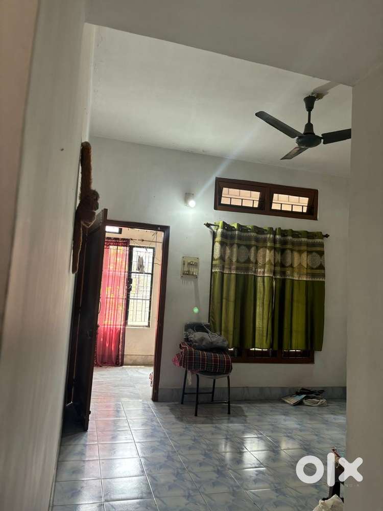 Separate room with attached balcony and kitchen