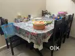 6 Seater wooden dining table with chairs for sale