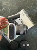 Canon Eos M with lens and flash