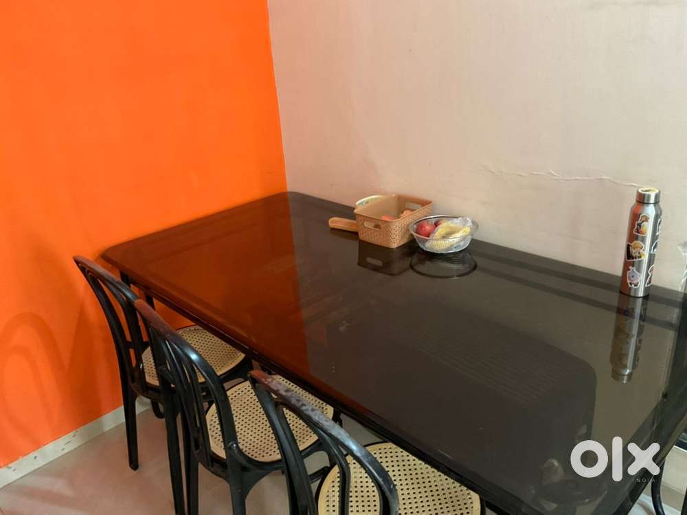 8 seater dining table and 4 chairs