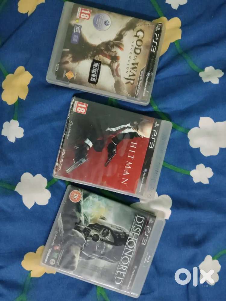 3 games of ps 3 God of war ascension ,hitman absolution and dishonored