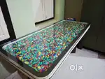Unique Glass Top Dining Table with Vibrant Pebble/Stone Design