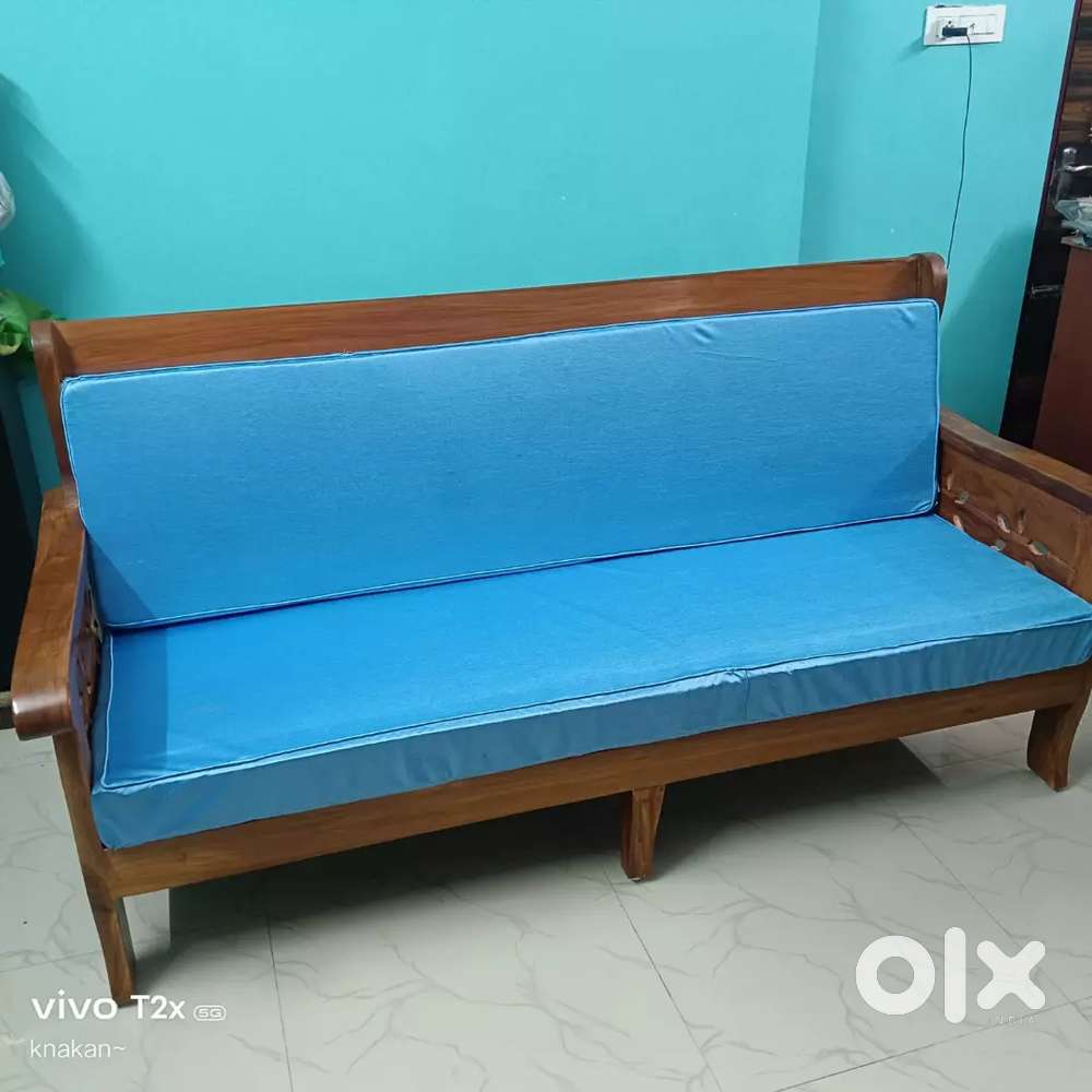 Solid segun wood 3-seater sofa in excellent condition