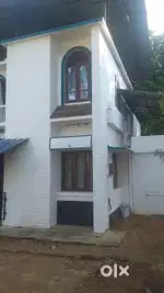 Double-Story  House+1 acre Rubber plot for urgent Sale Chithara Kollam