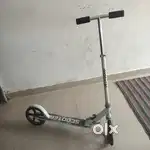 Daddy child kicking scooter