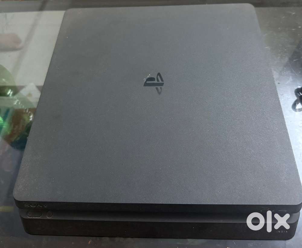 Sony PS4 with 2 Dual sense remote controllers.