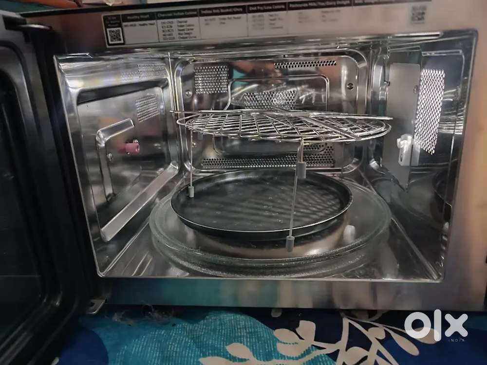 LG advanced, modern 2025 Micro oven with inbuilt charcoal rarely used