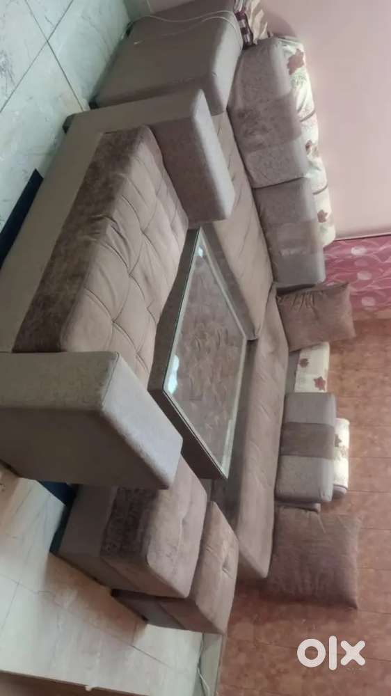 Sofa set in L shape with table urgent sale