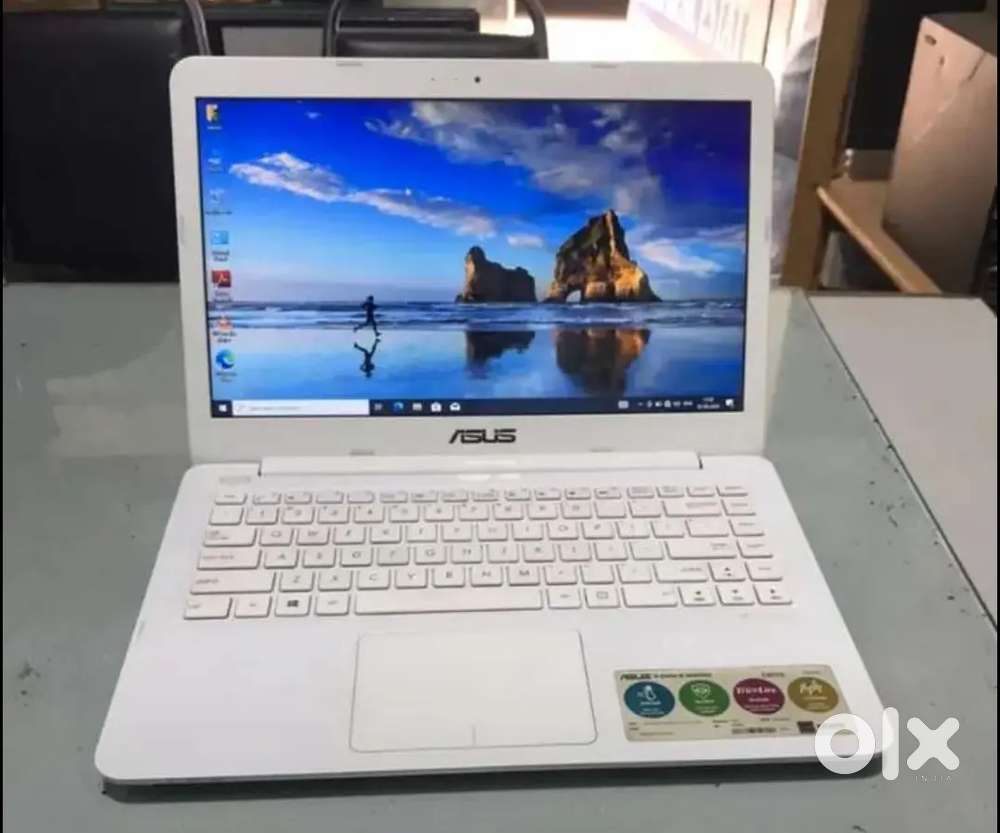 Asus laptop  + 240GB SSD + intel R processor with Windows 10