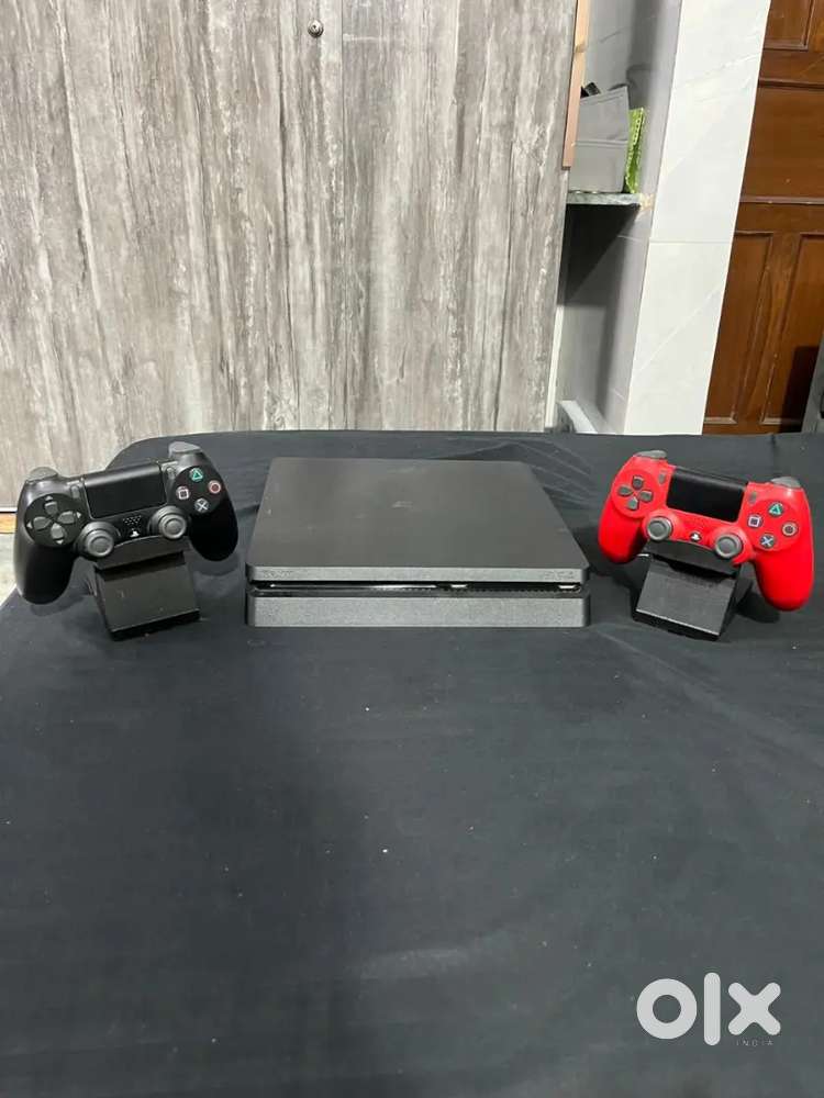 PS4 slim edition 1TB with 2 controller and 6 games brand new condition
