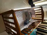 Baby crib with mattress , side protector