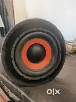 Bass tube with amplifier
