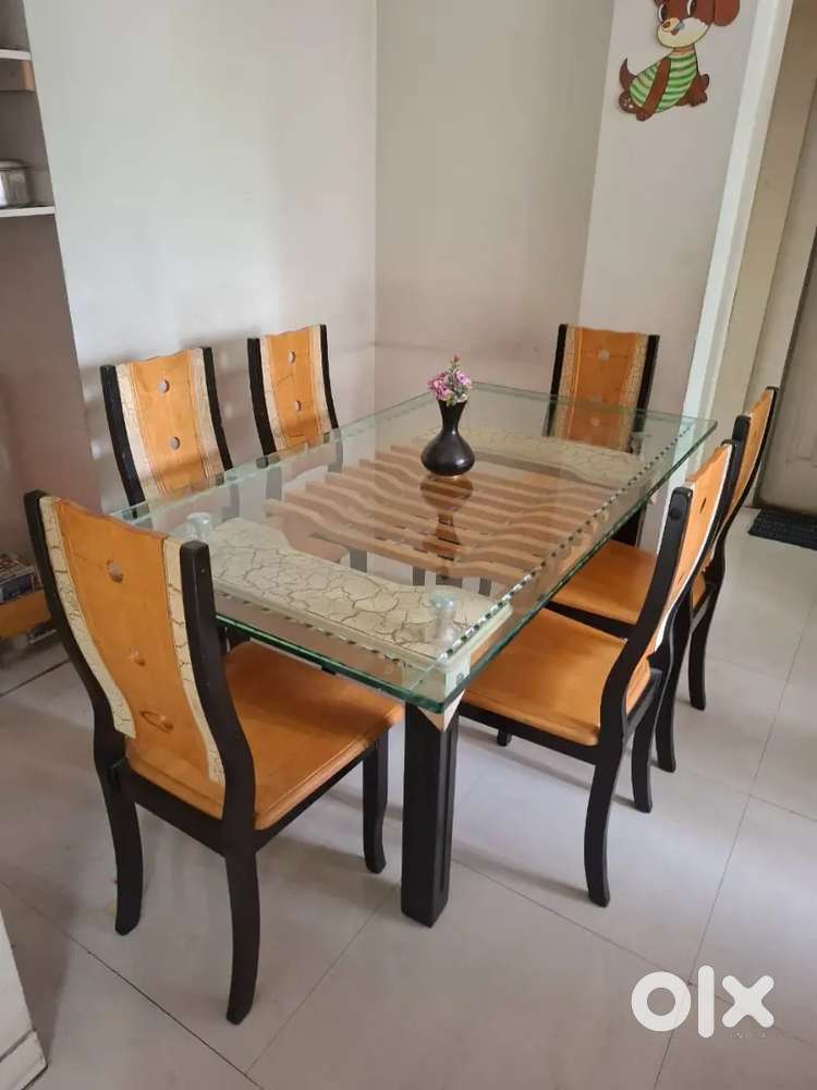 Six seater dinning table with chairs