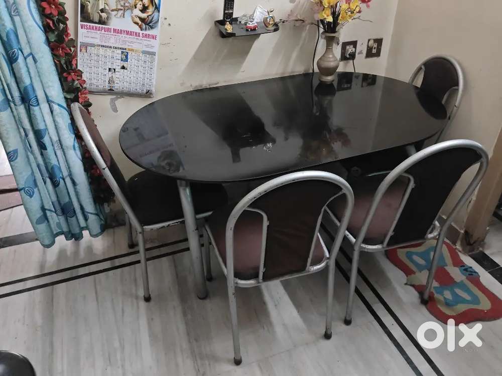 Glass top dining table
