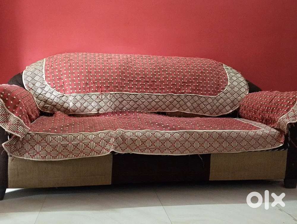 Wooden sofa, 4 years old brown and cream colour.