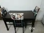 wooden dining table one years  old with extra chair  cushion