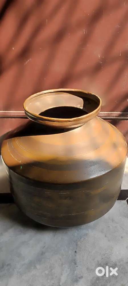 A shiny and new brass pot