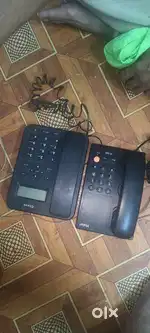 Two Telephones working condition