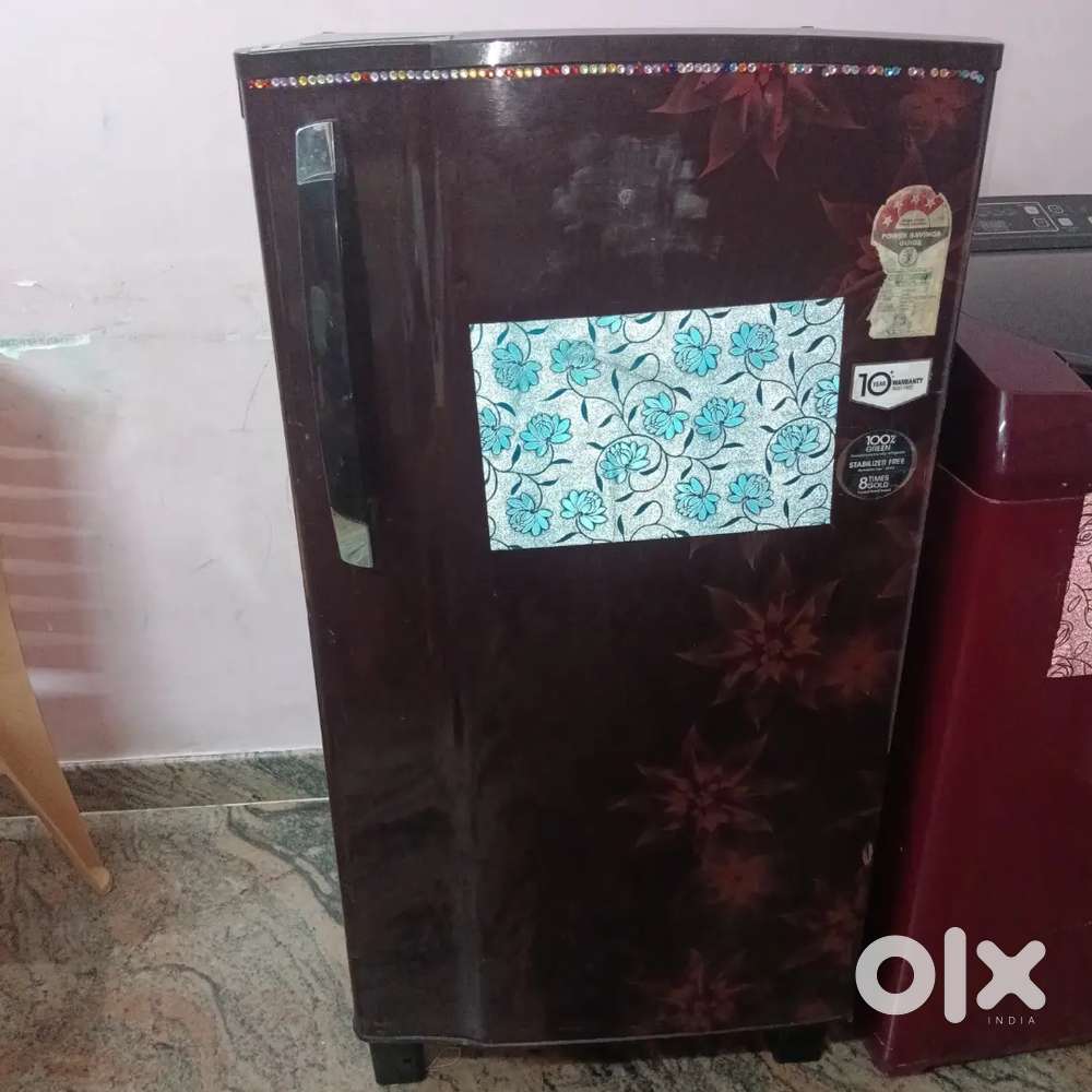 Godraj single door fridge and whirlpool top load 6kg washing machine