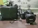 NikkonCoolpixP900 with 83xZoom(urgent sell with bill box charger&bag)