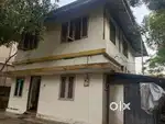 5 cent  1400sqft 4bhk  2 storied old house sale at Vennala . Eroor