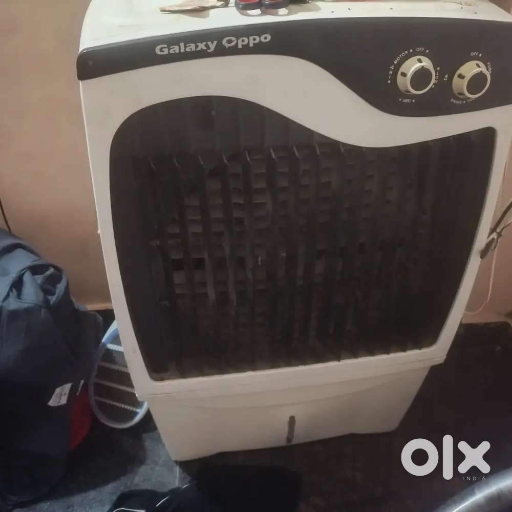 Galaxy cooler 65lts and two ceiling fans in gud and working condition