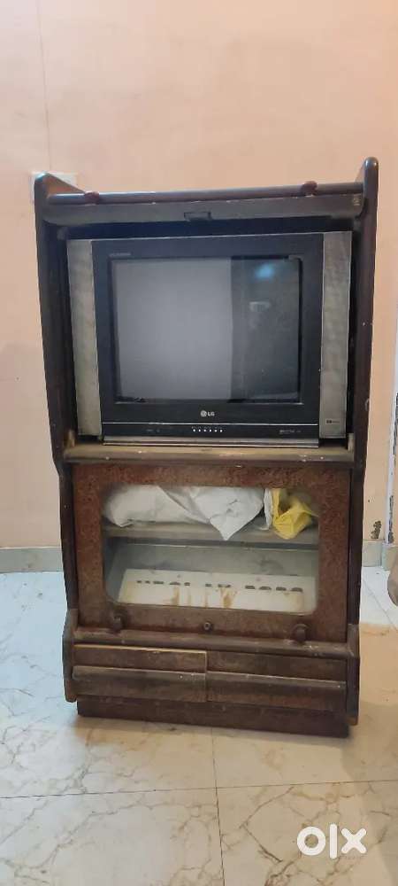 Lg flatscreen tv with trolley.