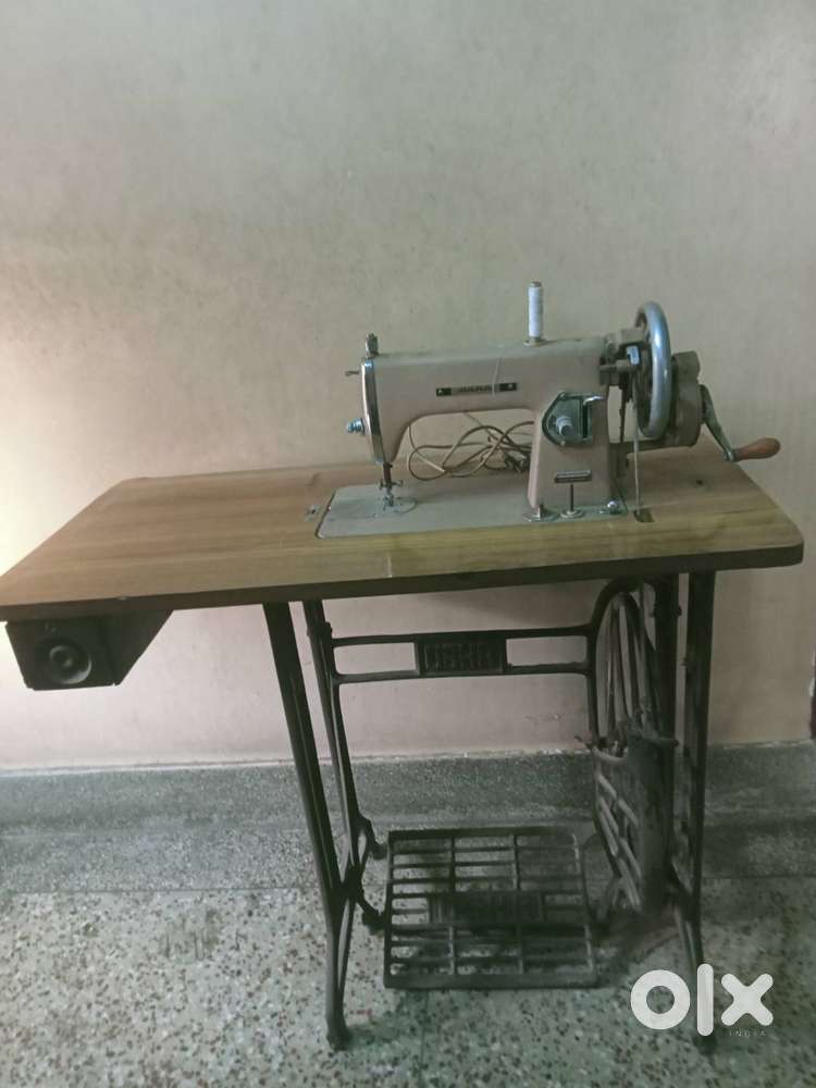 Usha Streamlined sewing machine with Table and Light