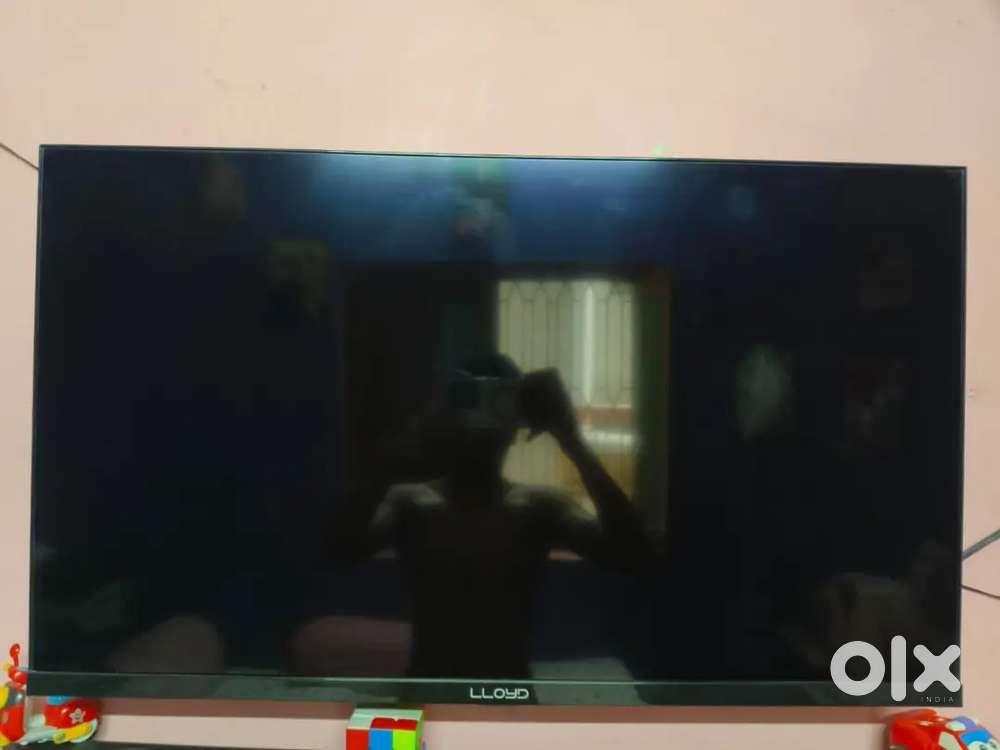 Lloyd led tv with magic remote inbuilt mouse