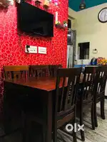 Teak Wood Dining Table. It is 3 to 4 years old.