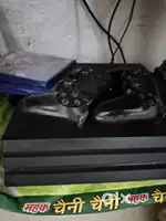 Ps4 pro with cd game and 2 controlers