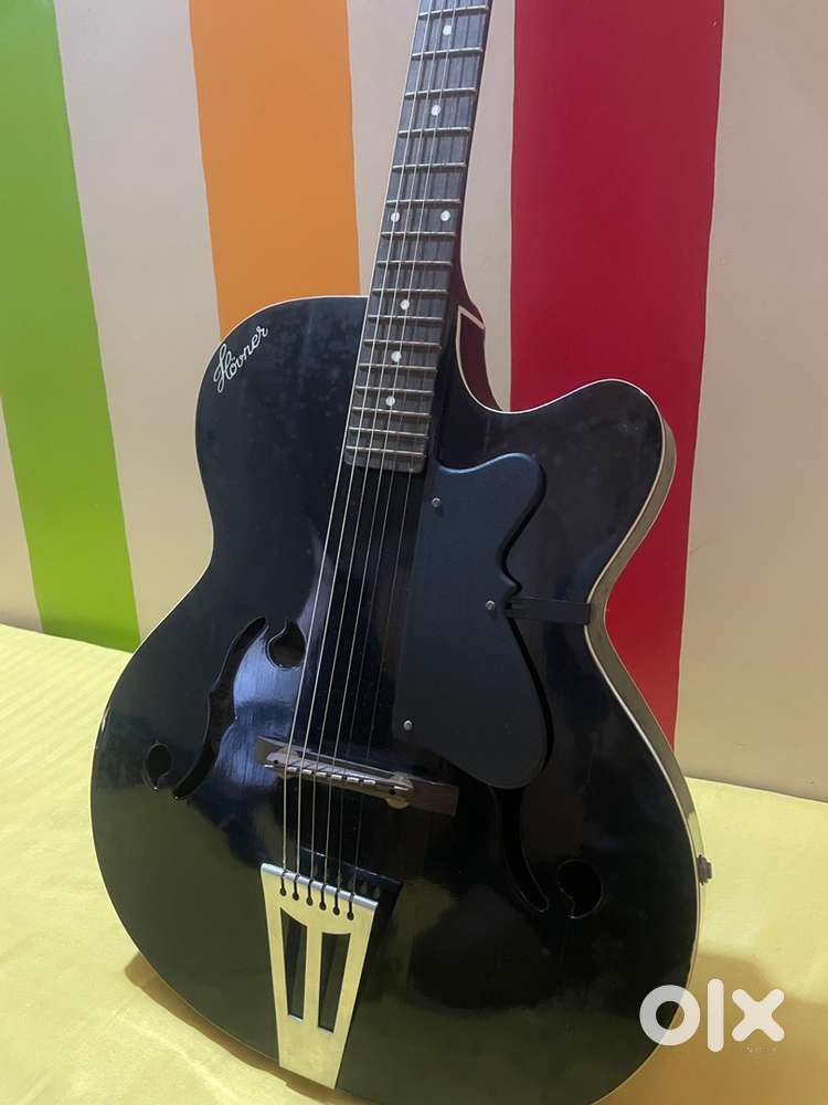 Black colour Guitar with Tuner, Capo and Pick