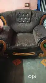 Comfortable sofa with glass table