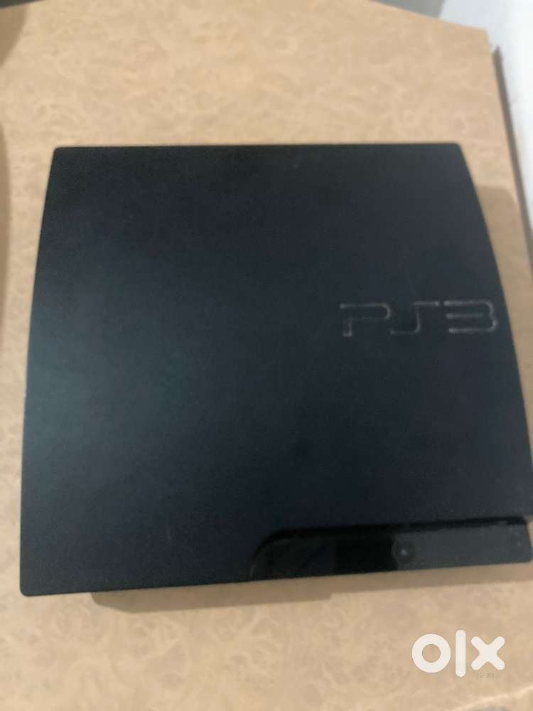 PS3 Slim 500 GB Console with a Controller