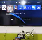 PS4 1TB 2 REMOTE 3 GAMES