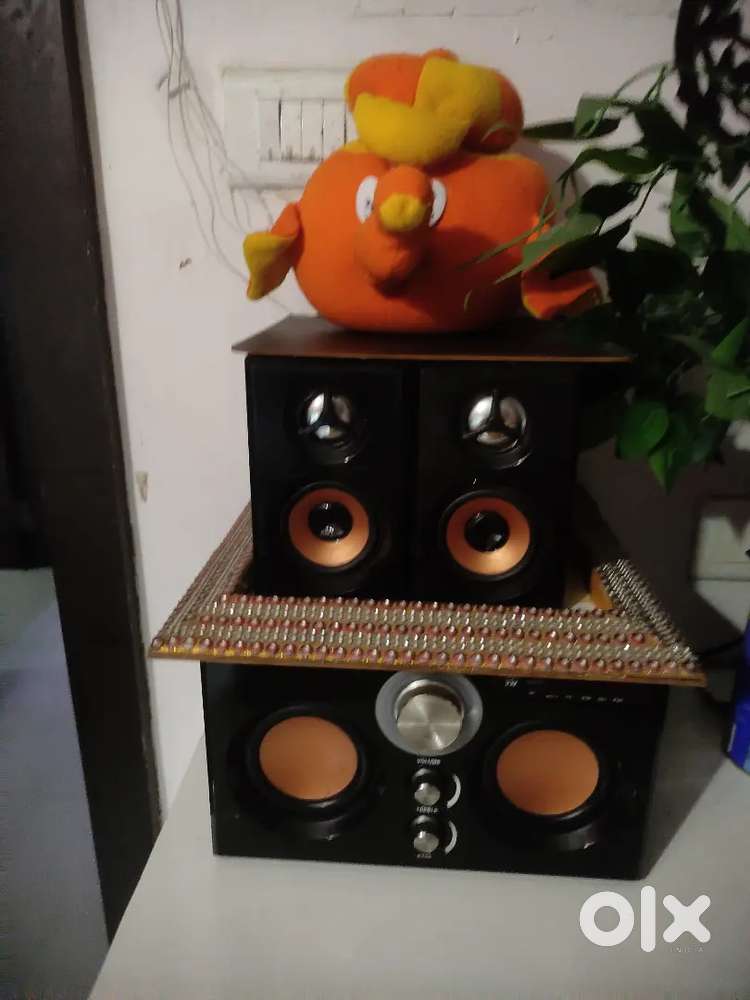 Music system with four speakers