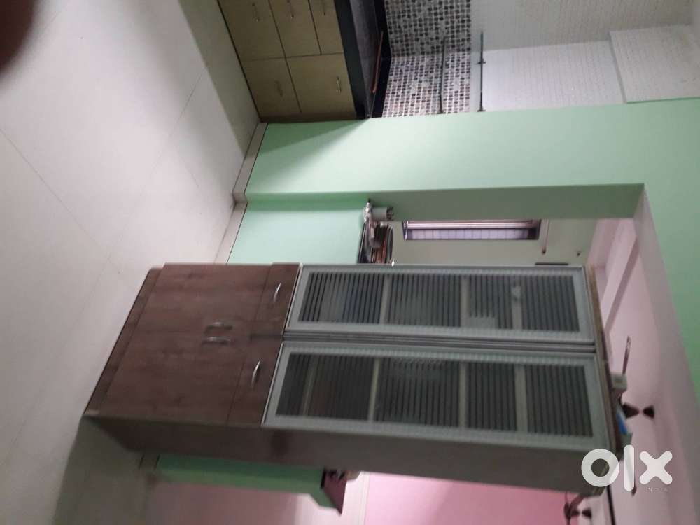 Cupboard with top glass panel