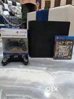 PS4 slim 500gb and two controller and gta5 disk