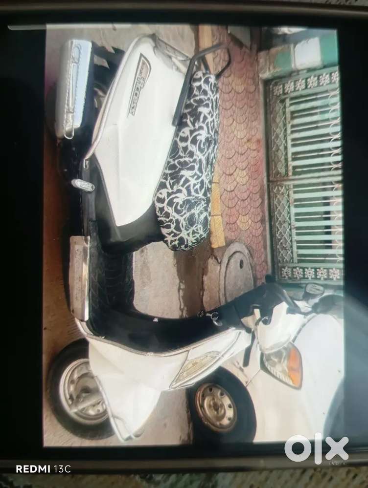 Suzuki Access 125 CC, White Color in good condition with documents.