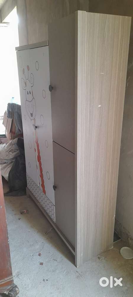 Kids Almirah in good condition with 3 doors ,shoe rack
