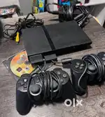 Ps2 new with 50 games with hard disk and 2 joysticks