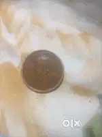One quarter anna coin