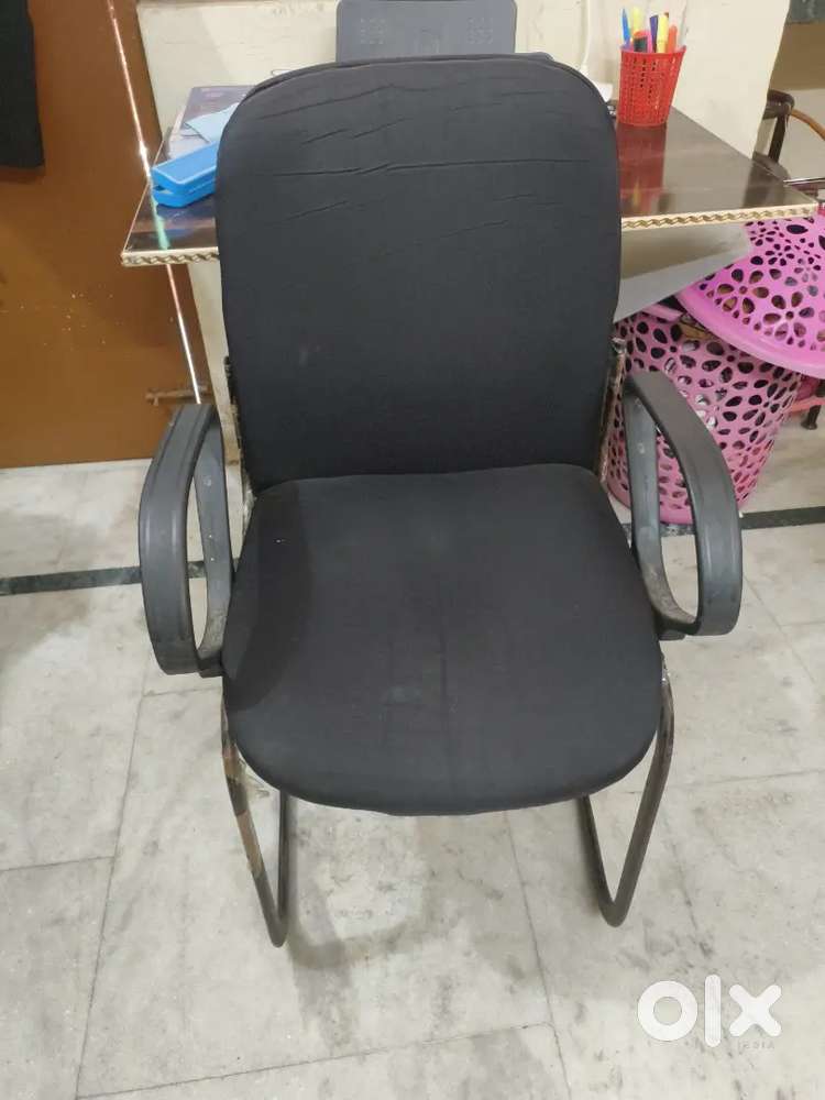 Chair with metallic body