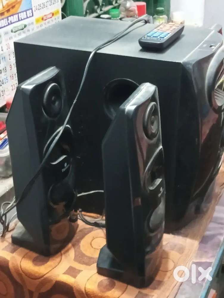 A big woofer and 4 speakers with remote for sale