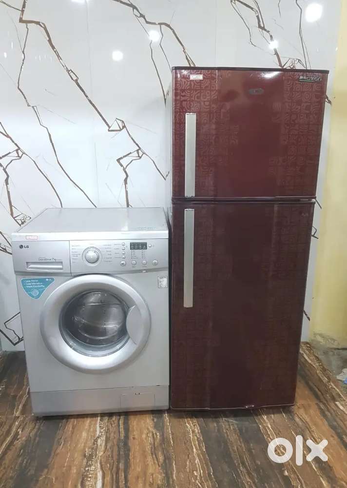 Whirlpool double door refrigerator and lg front load washing machine $