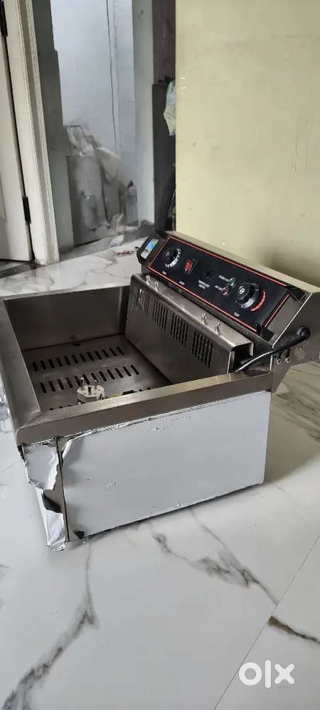 Likely used fryer, warmer and charcoal shawarma machine