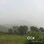 WHERE TWO HILLS MEET THE SKY AND SERENITY WGISPERS IN THE AIR.