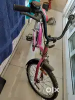 Kids bycycle with side wheels