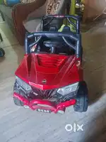 A ride-on toy car for kids.
