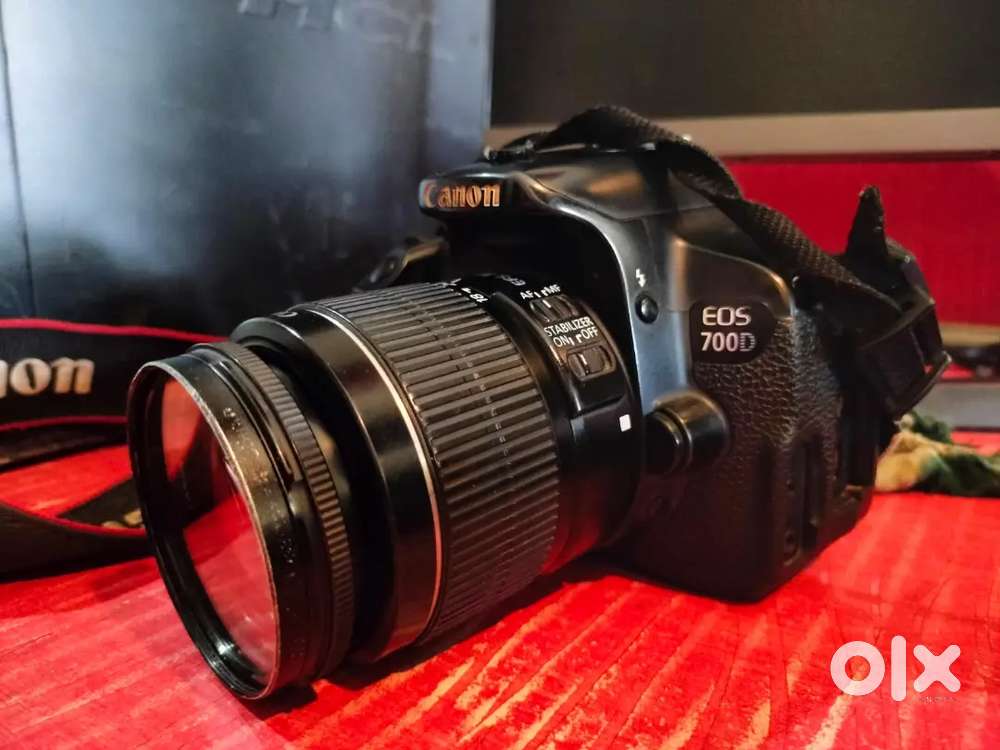 Canon Camera with 2  lens 3 battery 1 charger